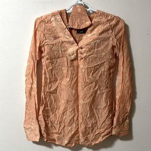 Brand new top with a separate matching camisole and a mask.